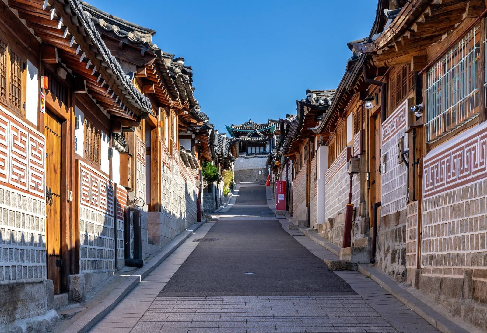 Bukchon Hanok Village street near the bus stop, Seoul (location photo, not a drama still)