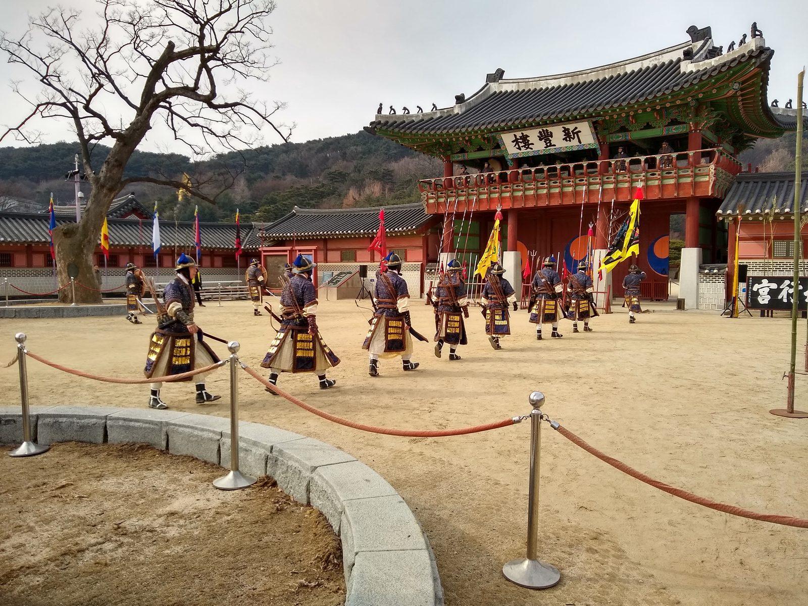 Hwaseong Fortress gate with guards, Suwon — a Love in the Moonlight filming location (location photo, not a drama still)